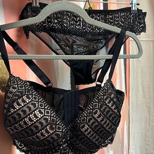 Adore Me black bra and panty set